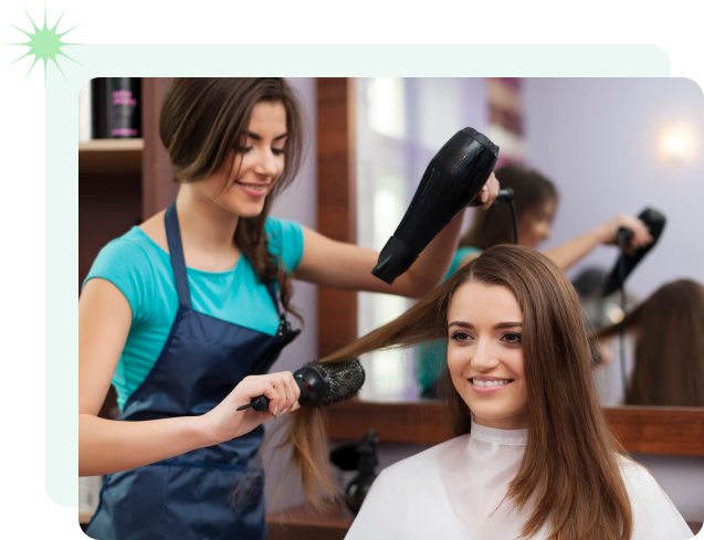 A woman receives a hairstyle makeover from a professional hairdresser in a salon setting.